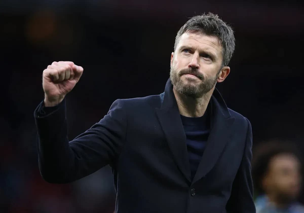 Coach celebrating victory with clenched fist gesture Coach celebrating victory with clenched fist gesture