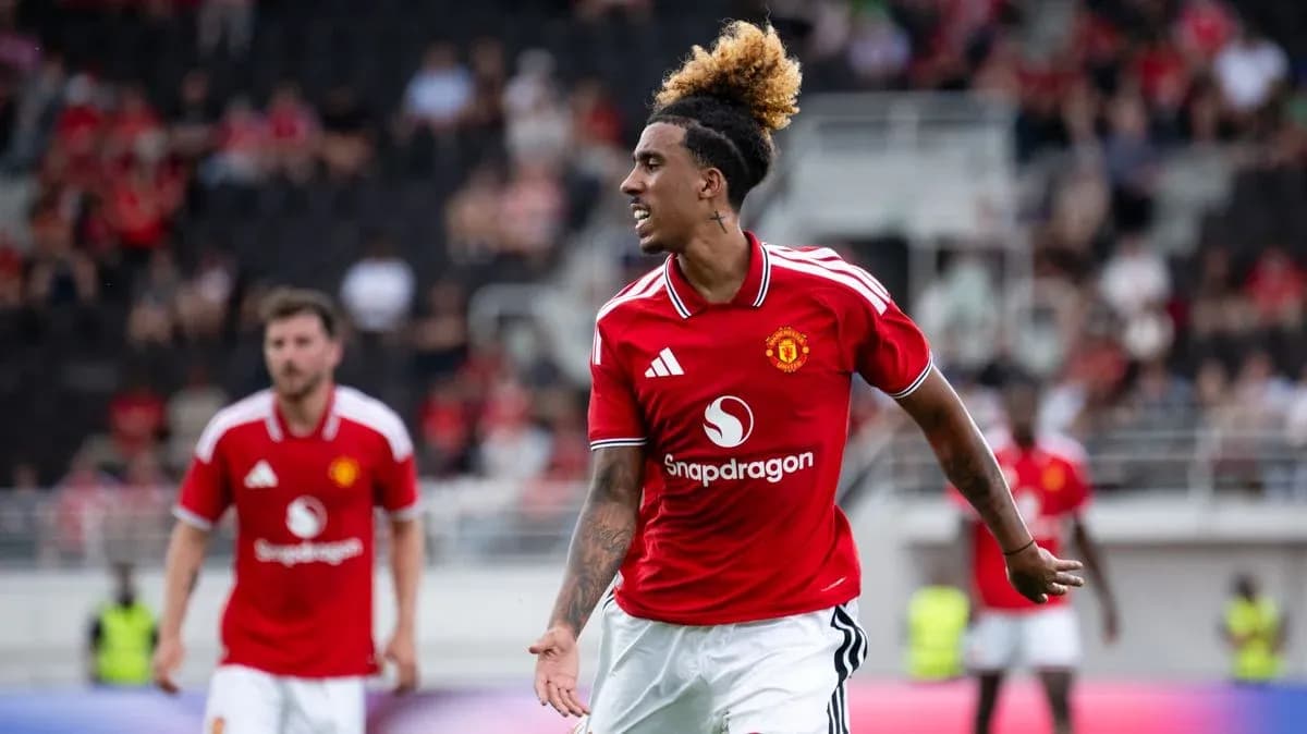 Player celebrating in Manchester United jersey during match Player celebrating in Manchester United jersey during match