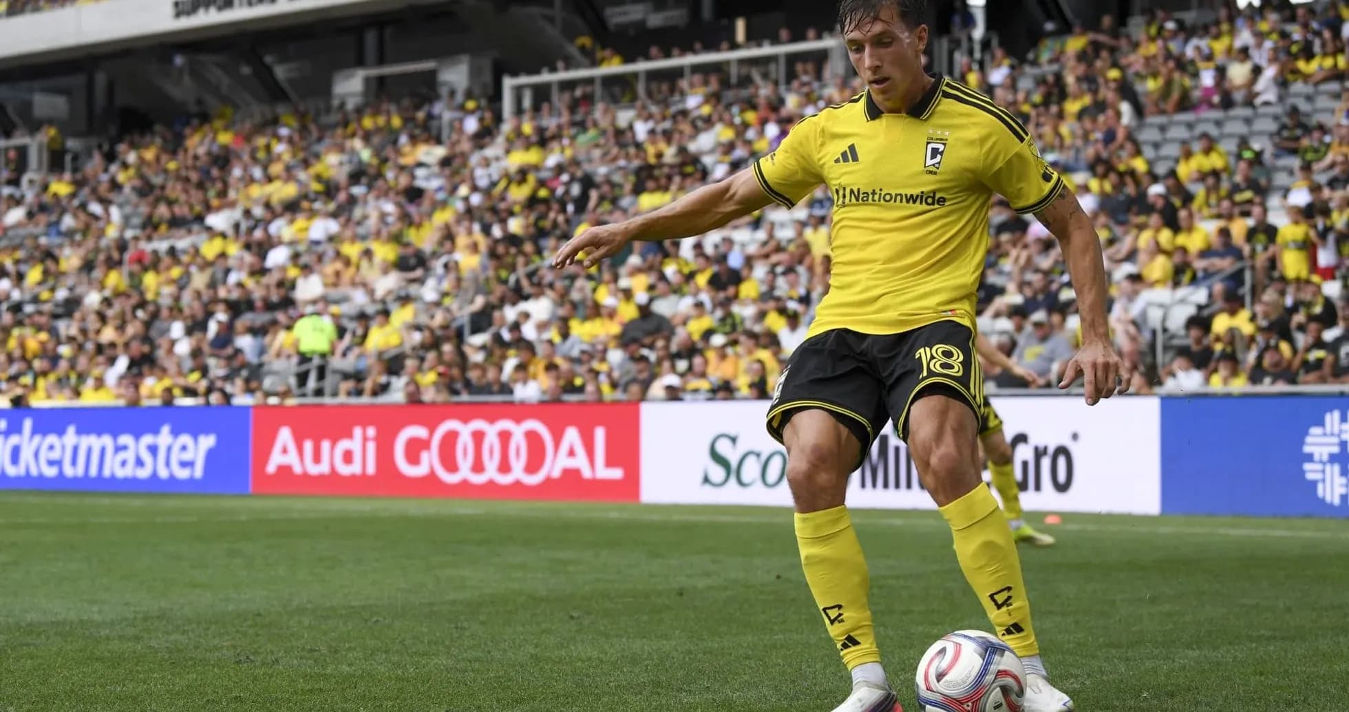 Player taking a corner kick for Columbus Crew Player taking a corner kick for Columbus Crew