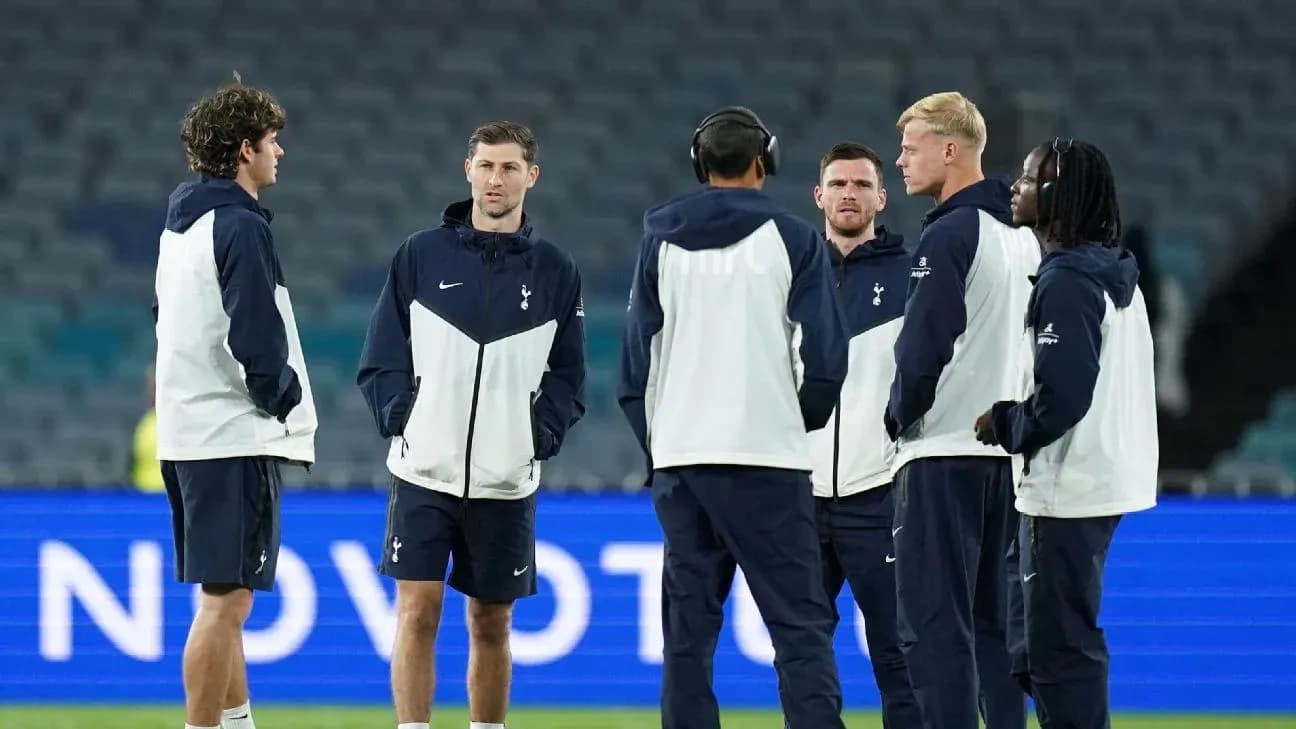 Tottenham players discussing on the pitch before match Tottenham players discussing on the pitch before match