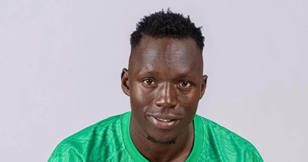 Player wearing green jersey posing for portrait Player wearing green jersey posing for portrait