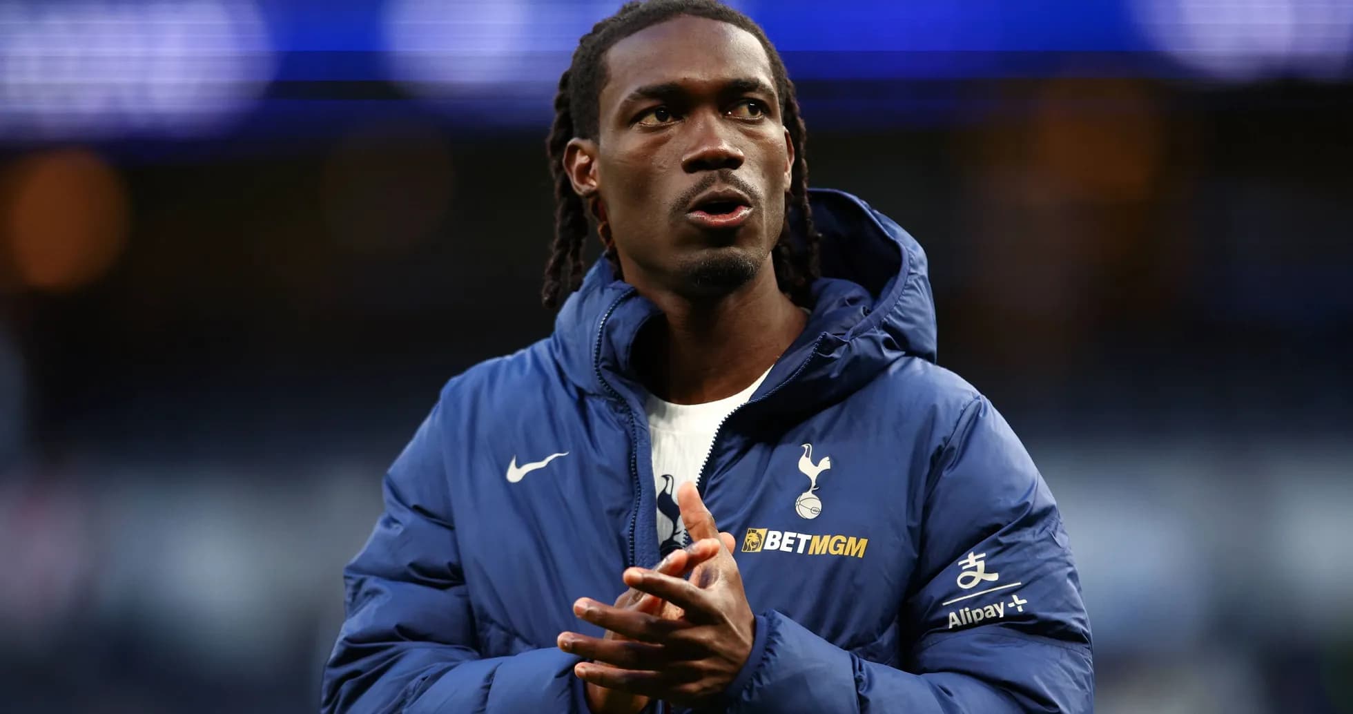 Player in Tottenham jacket warming up before match Player in Tottenham jacket warming up before match
