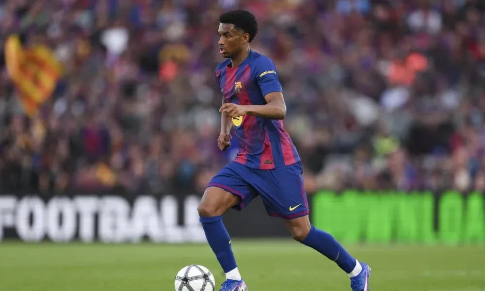 Player in Barcelona kit dribbling the ball Player in Barcelona kit dribbling the ball
