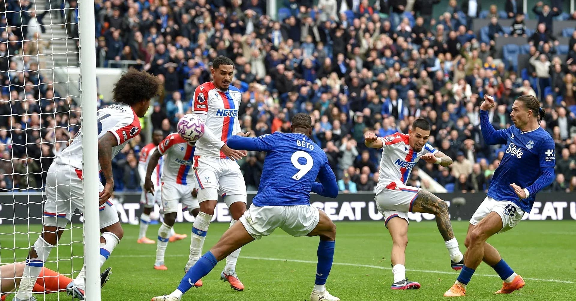 Players contesting for the ball in match action Players contesting for the ball in match action
