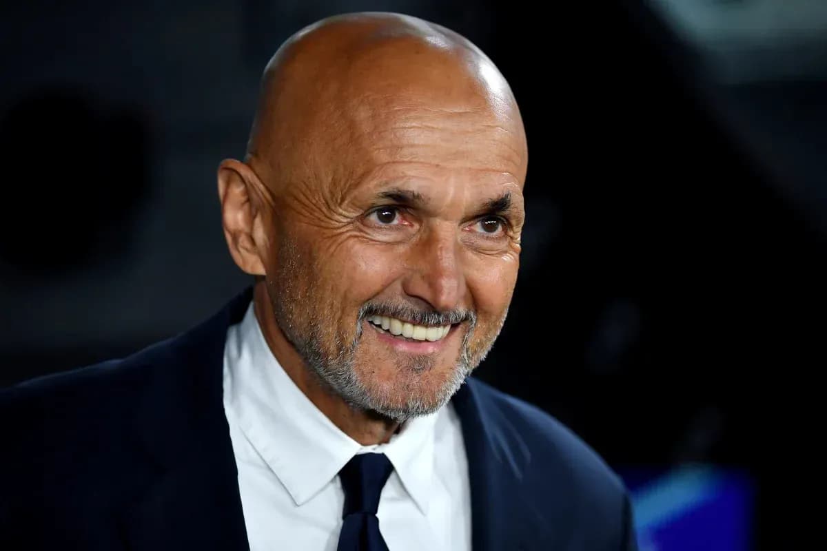Smiling man in a suit at event Smiling man in a suit at event