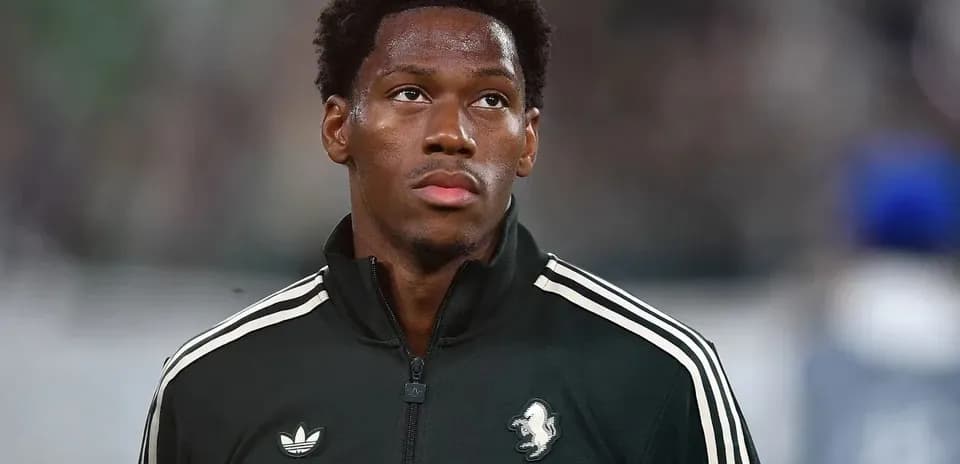 Player in black tracksuit before the match Player in black tracksuit before the match