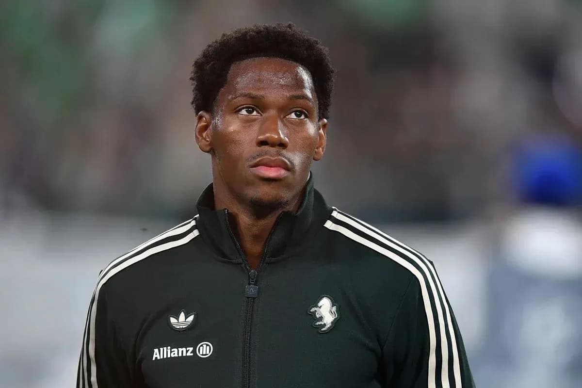 Player in black tracksuit before the match Player in black tracksuit before the match