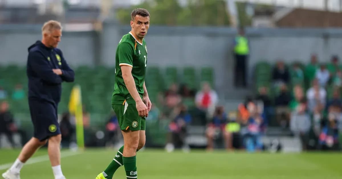 Player in green jersey on the pitch during match Player in green jersey on the pitch during match