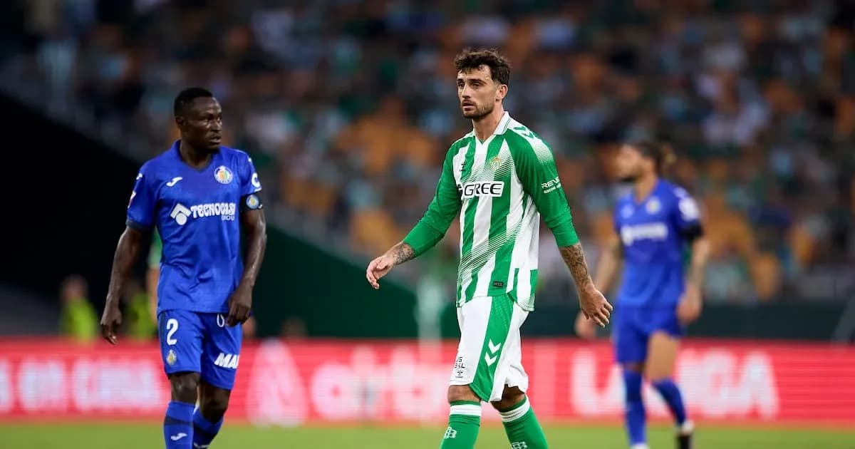 Real Betis and Getafe players during a match Real Betis and Getafe players during a match