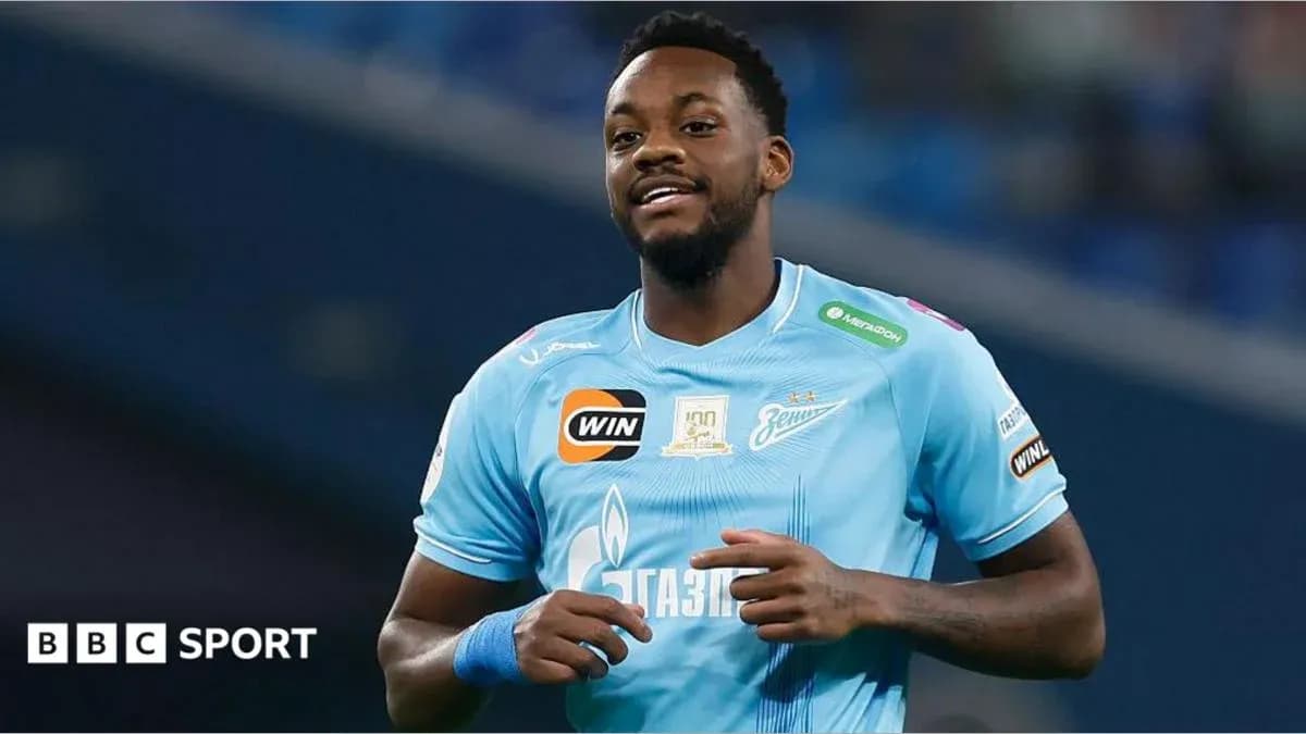 Player in light blue jersey smiling during match Player in light blue jersey smiling during match