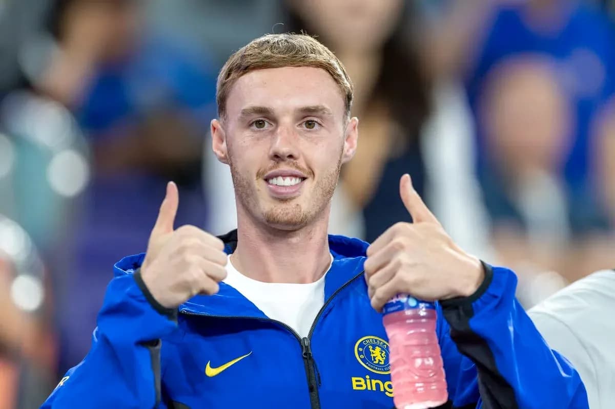Player giving thumbs up in team jacket Player giving thumbs up in team jacket
