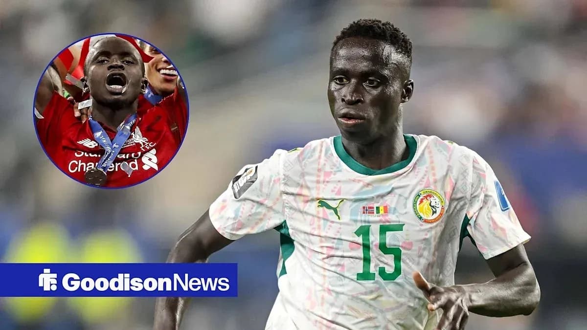 Senegalese player running on the field during match Senegalese player running on the field during match