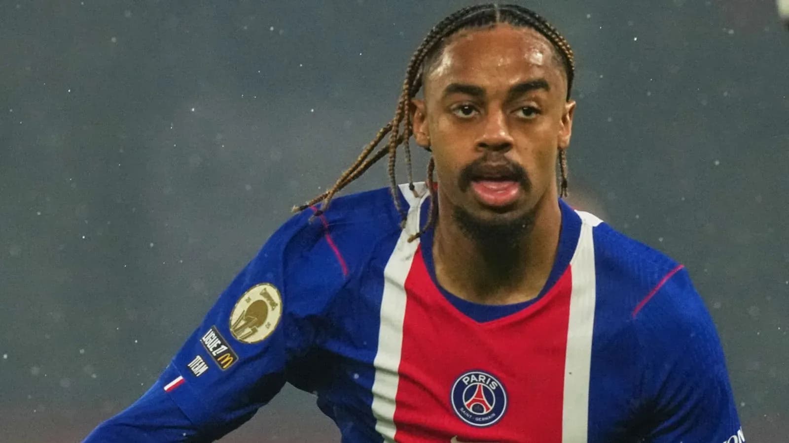 Player running in Paris Saint-Germain jersey during match Player running in Paris Saint-Germain jersey during match