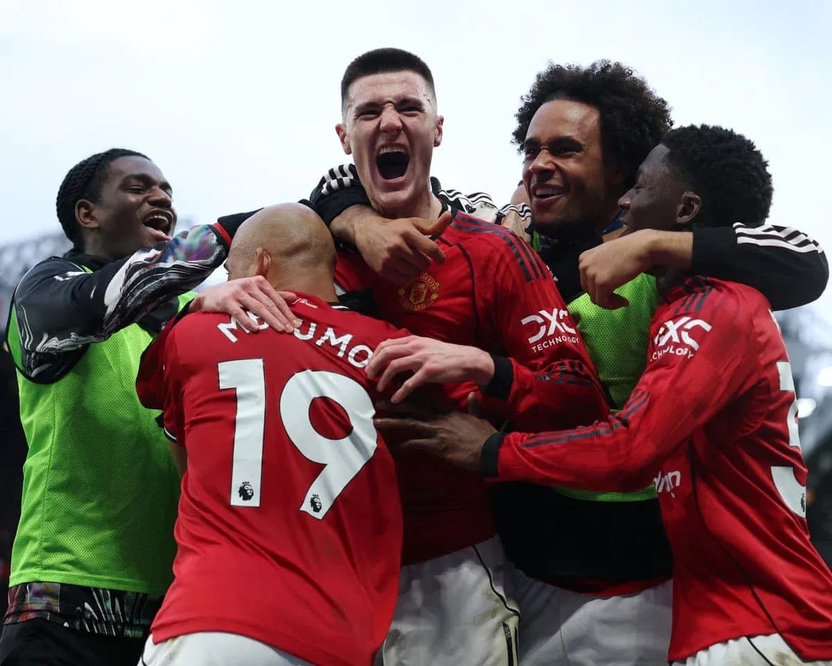 Manchester United players celebrating a goal Manchester United players celebrating a goal