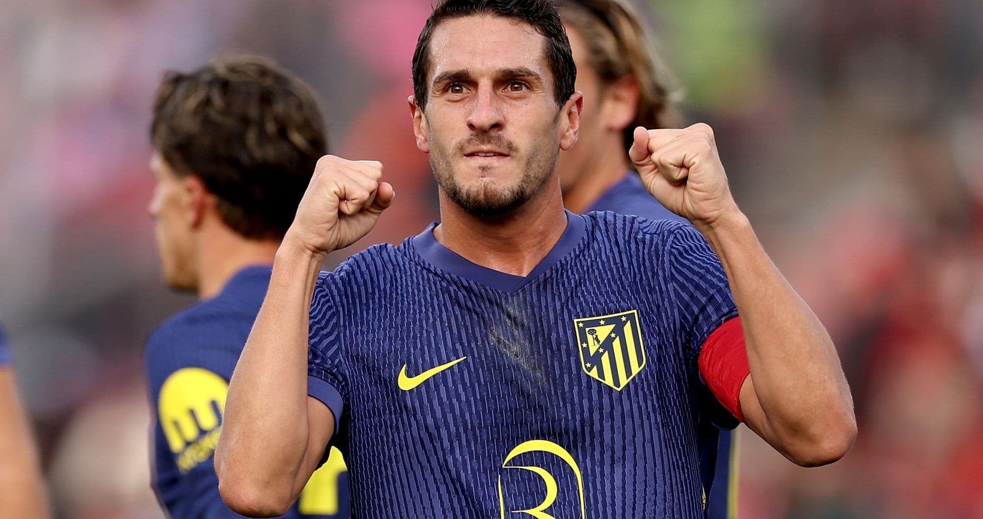 Atletico Madrid player celebrating a goal Atletico Madrid player celebrating a goal