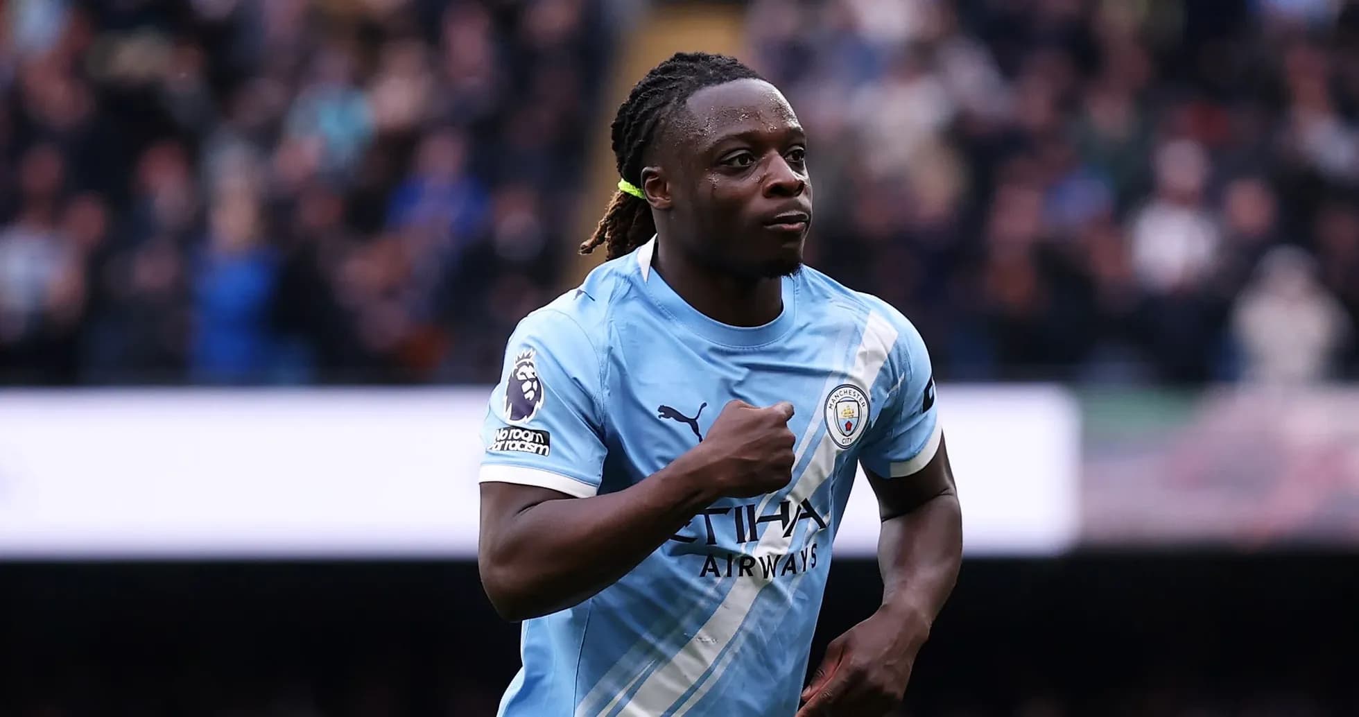 Player celebrating after scoring for Manchester City Player celebrating after scoring for Manchester City