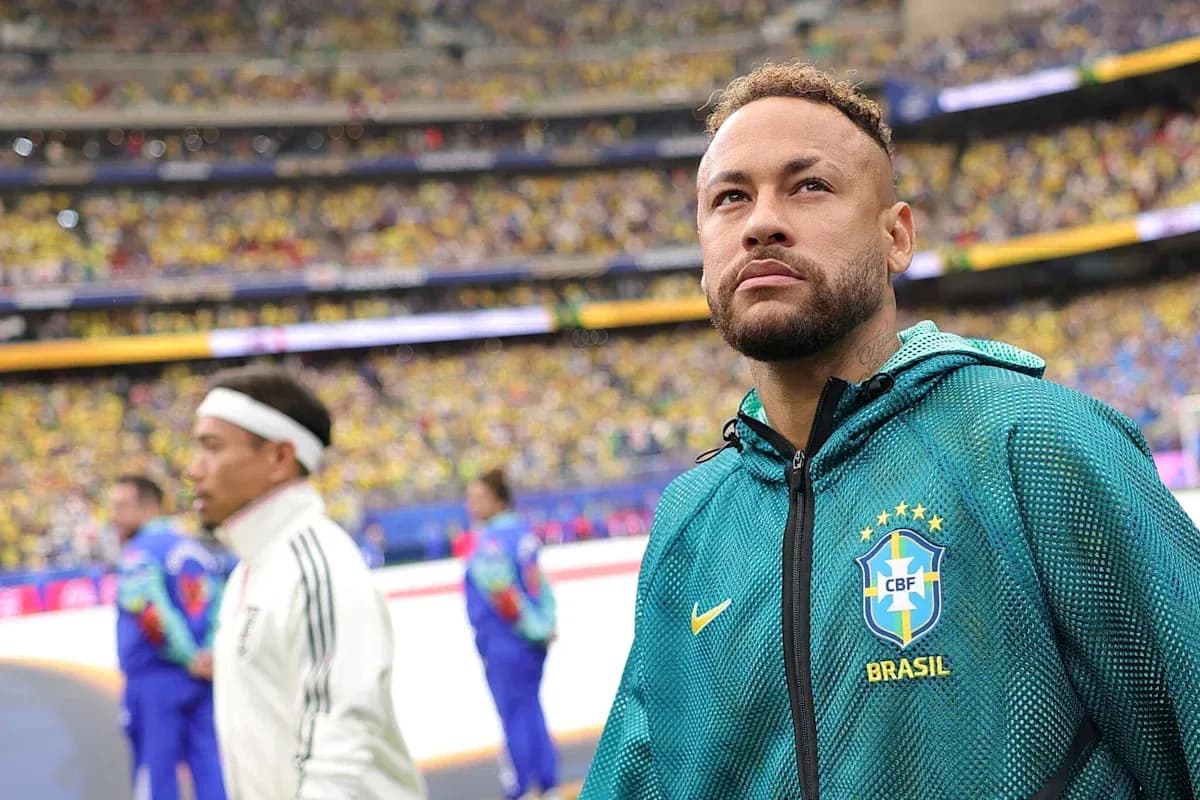 Neymar standing on field before match with crowd Neymar standing on field before match with crowd