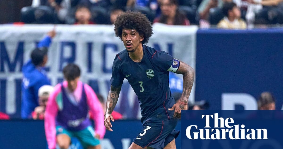 Player in USA jersey running on the field Player in USA jersey running on the field