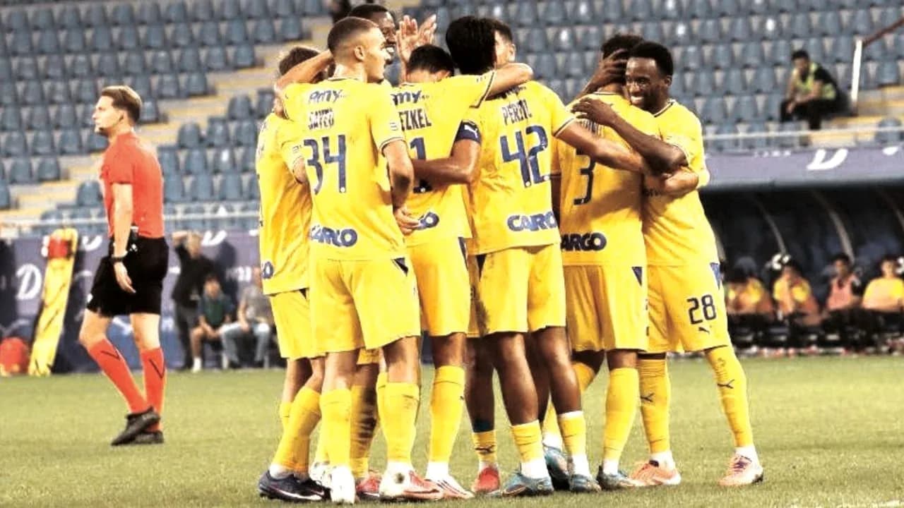 Maccabi Tel Aviv players celebrating a goal Maccabi Tel Aviv players celebrating a goal