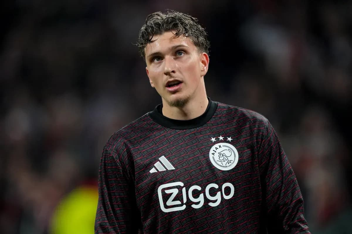 Goalkeeper in Ajax uniform during a match Goalkeeper in Ajax uniform during a match