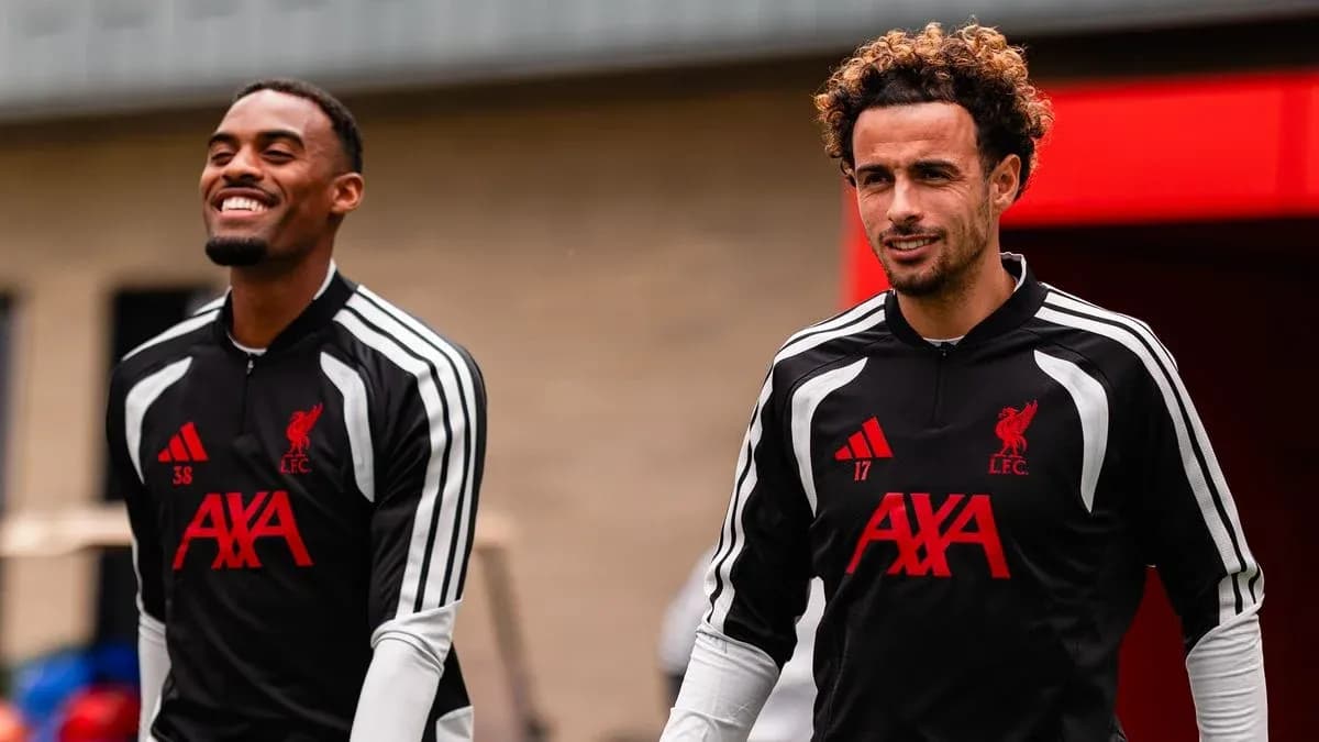Two Liverpool players arriving for training session Two Liverpool players arriving for training session
