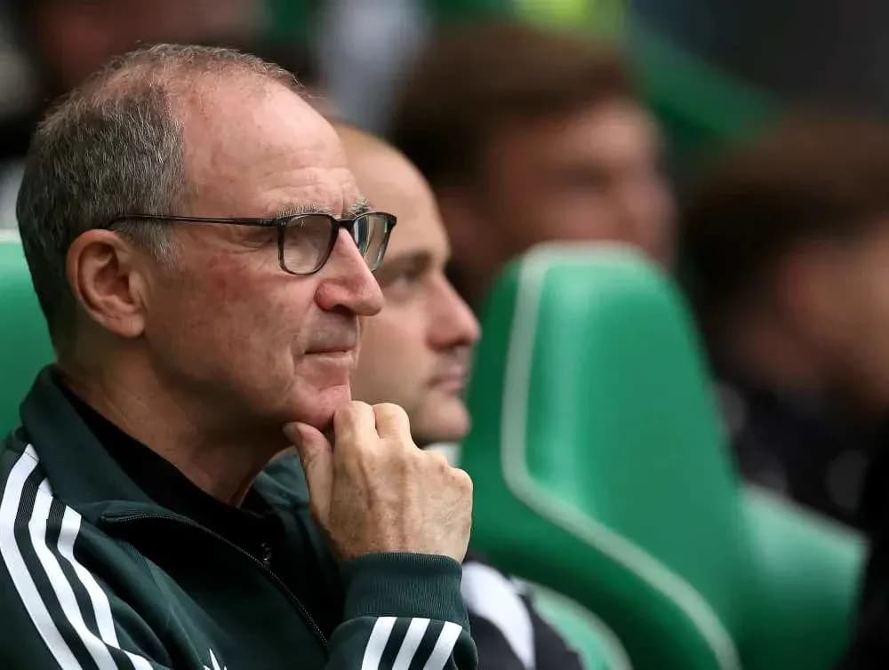 Coach observing from the bench during a match Coach observing from the bench during a match